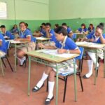 Brechas de género y abandono escolar frenan avance del sistema educativo en RD
