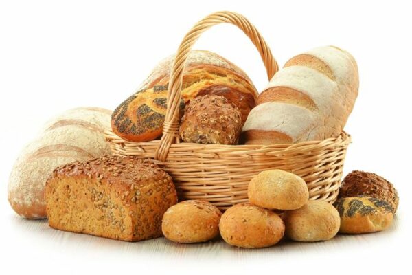 11844544 – composition with bread and rolls in wicker basket isolated on white