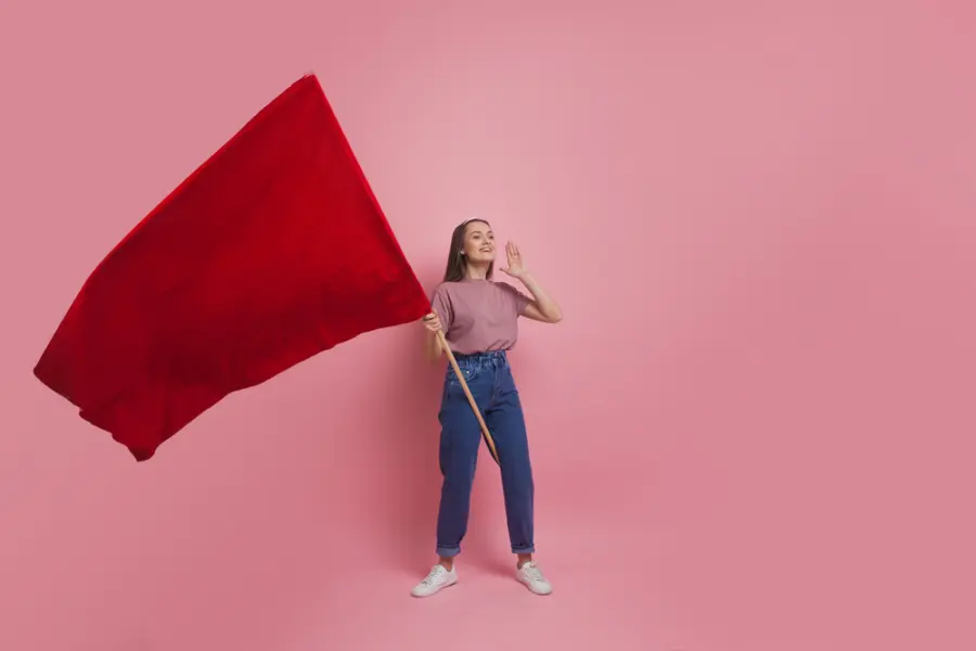 Young,And,Beautiful,Girl,With,A,Red,Flag,On,A