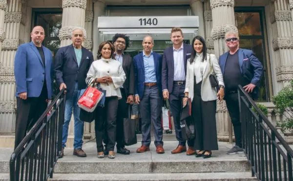 Félix García y Edwin de los Santos  junto a ejecutivos del Berklee College of Music.