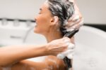 Haircare,Cosmetics.,Woman,Washing,Head,Applying,Shampoo,On,Long,Brown