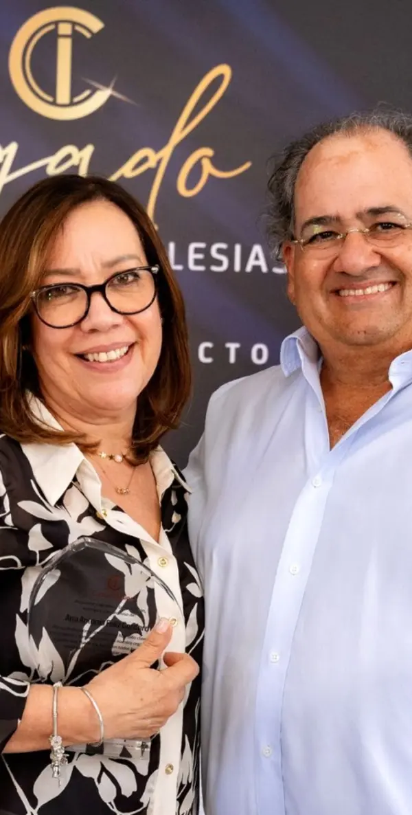Ana Féliz Cordero, quien tiene 40 años en la organización y Miguel Feris Chalas.
