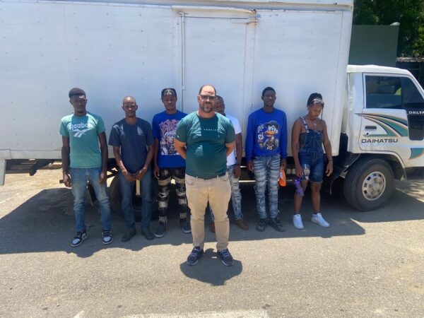 Camionero con haitianos