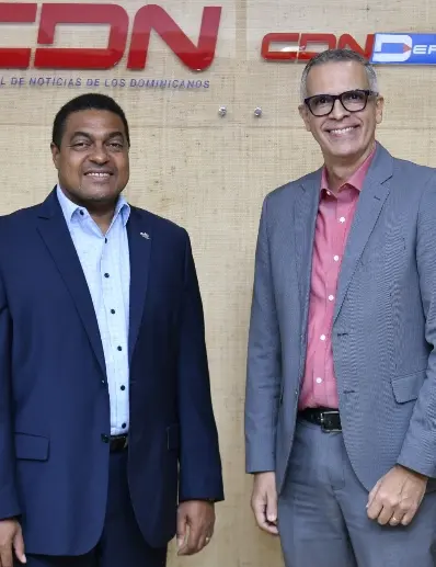 José P. Monegro junto a Frank Camilo