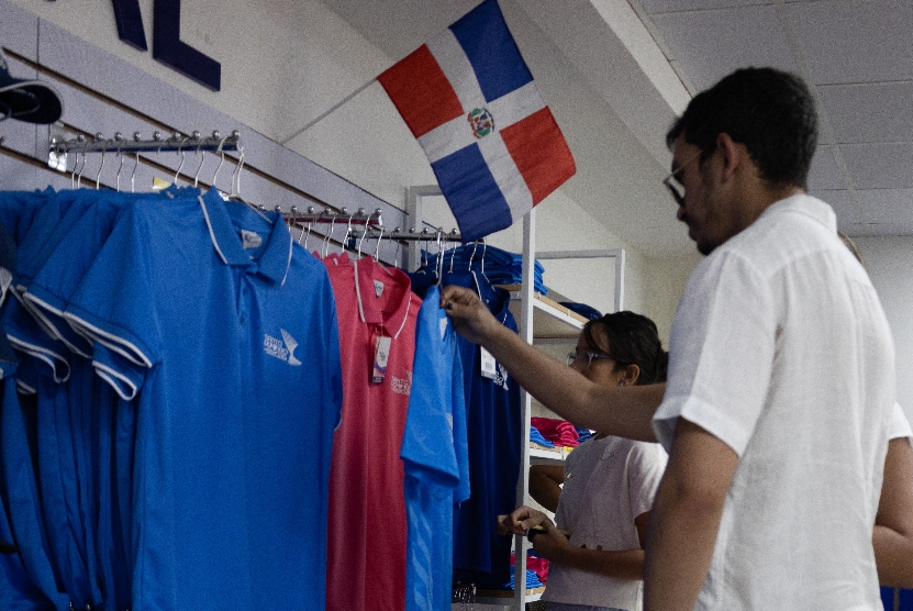 Turistas impulsan el flujo económico en tienda Juegos Centroamericanos y del Caribe