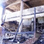 Incendio consume parte de edificio frente a la UASD y deja a decenas sin hogar