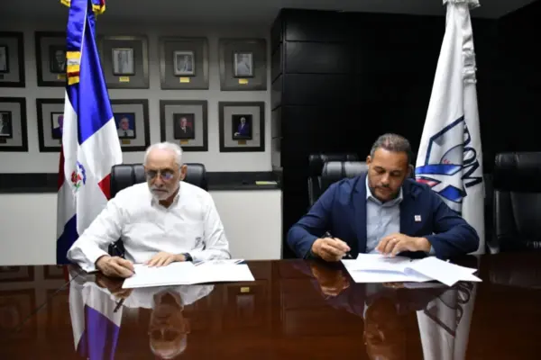 erick y vitelio mejia firma convenio